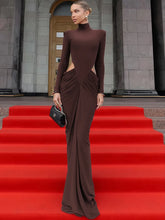 Brown ruched turtleneck evening gown styled for red carpet glamour