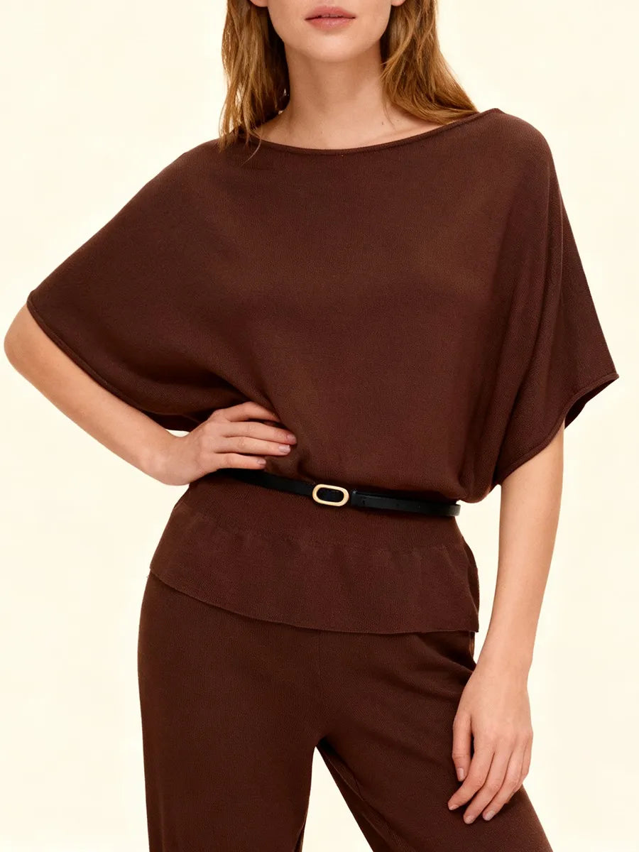 Close-up of sash neckline and belt on brown knit tunic