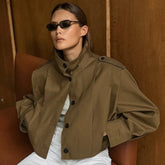 Brown short trench jacket with turtleneck styled for autumn