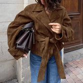 Brown suede tie-waist jacket styled for cozy winter layering