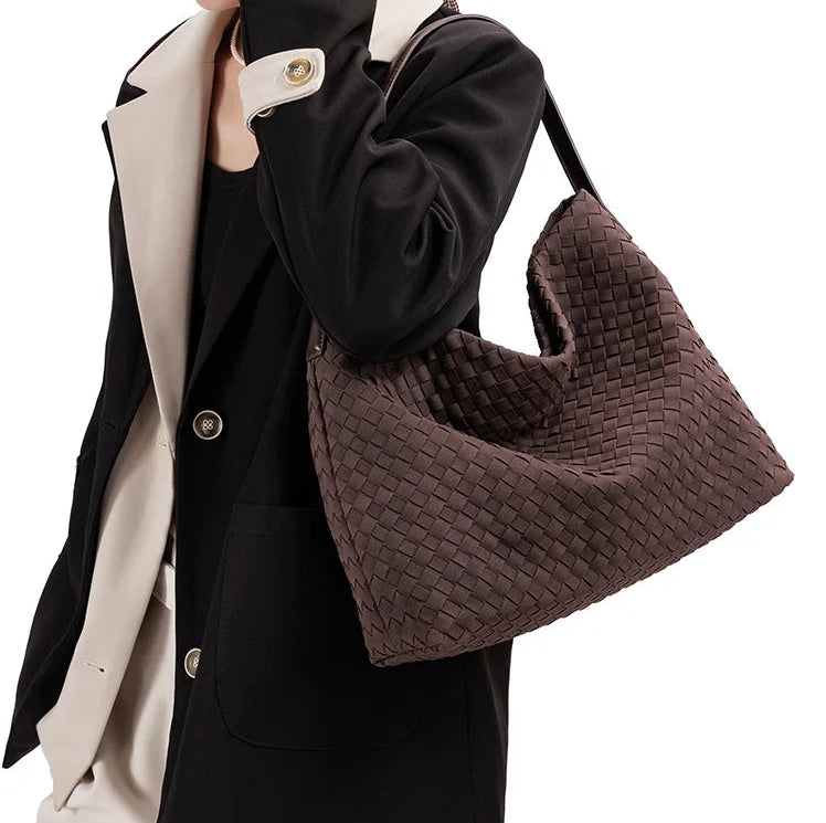 Woven-texture shoulder tote bag in a softly structured bucket shape