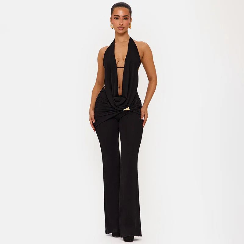 Two-piece night out outfit with halter top and flare pants on a white backdrop