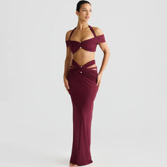 side angle showing high waist bodycon maxi skirt in wine tone