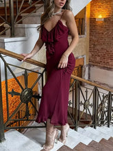Burgundy chiffon tiered slip dress styled for summer occasions