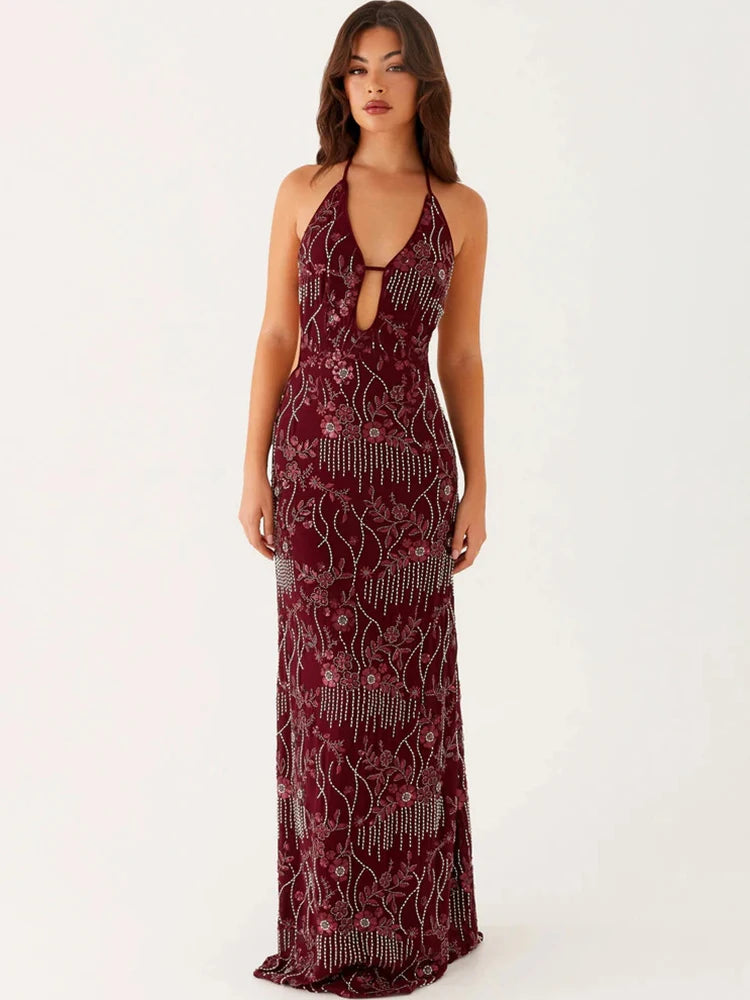 Burgundy sequin halter gown styled for formal events and weddings