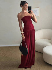 Burgundy strapless evening gown styled for minimalist formal events