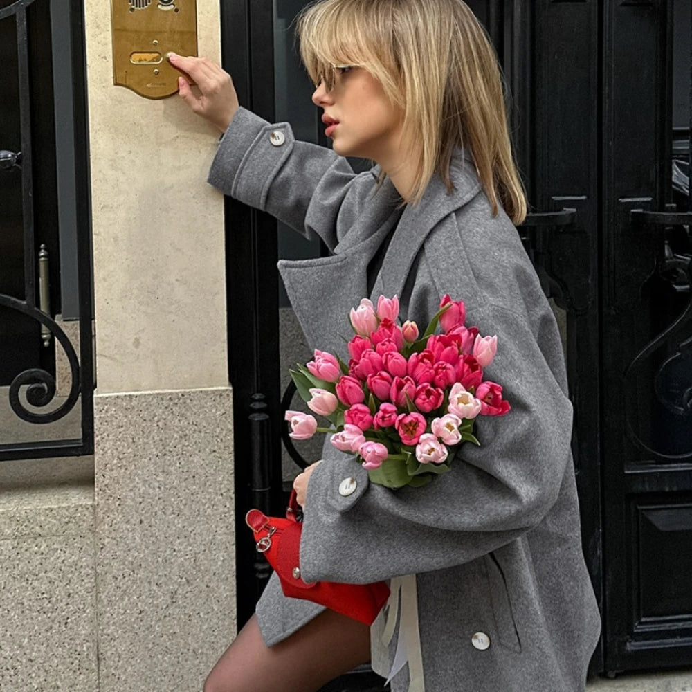 Business casual gray blazer coat styled for events and meetings