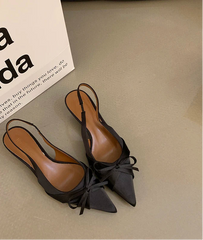 Women’s pointed-toe heels with bow detail and square heel