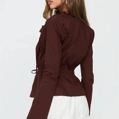 Button-down peplum top in brown with pockets for workday essentials