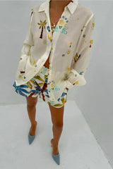 Side view showing relaxed shirt fit and elastic-waist shorts