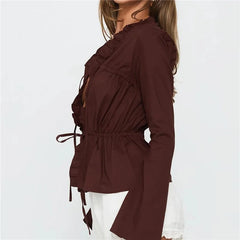 Casual flare brown shirt shown with button-down front for easy layering