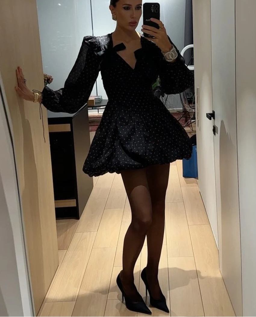 Casual vintage polka mini party dress displayed as spring classic