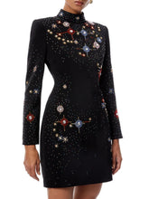 A-line evening mini dress with celestial diamond embellishments and sculptural stand collar
