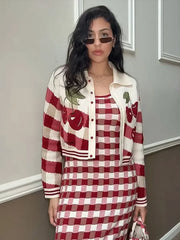 Round neck knit cardigan showing embroidery placement and knit texture