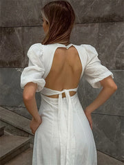 Close-up of tie-back open design on white summer dress