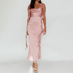Close-up of pink ruffled trim and square neckline detail on bodycon gown