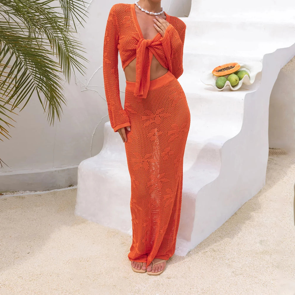 Coastal chic knit vacation outfit in light blue for warm weather