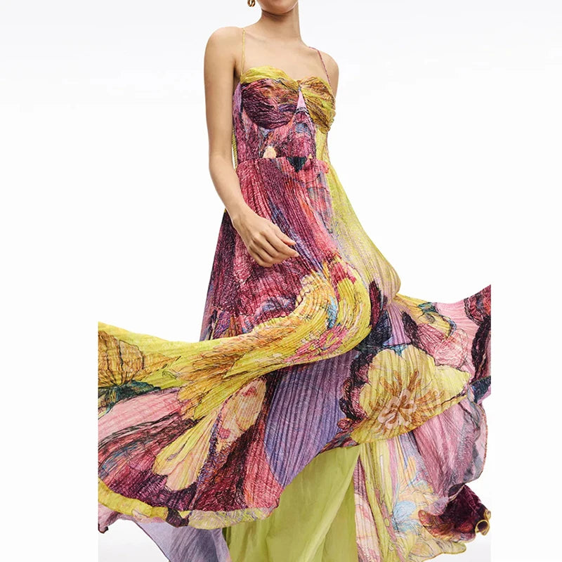 Flowy pleated strapless summer dress twirling with motion and color