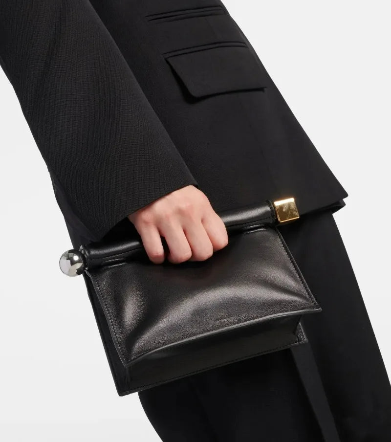PU clutch bag with exterior slip pocket and chain strap styling