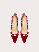 Corduroy pointed stiletto heels in red with elegant pearl detailing