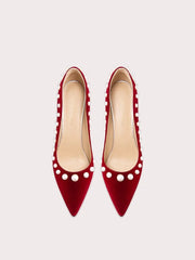 Corduroy pointed stiletto heels in red with elegant pearl detailing