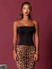 Close-up of corset top paired with leopard pattern sequin skirt