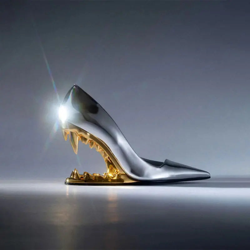Fashion-forward silver and gold art heel shoes styled for women
