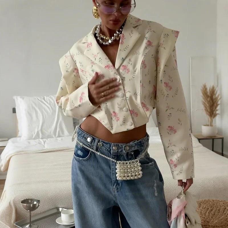 Cropped floral print jacket styled for playful autumn layering