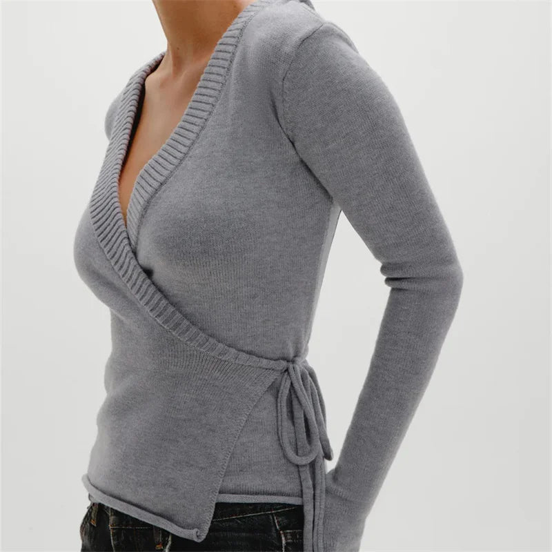 Crossover knit top showing gentle drape and structure