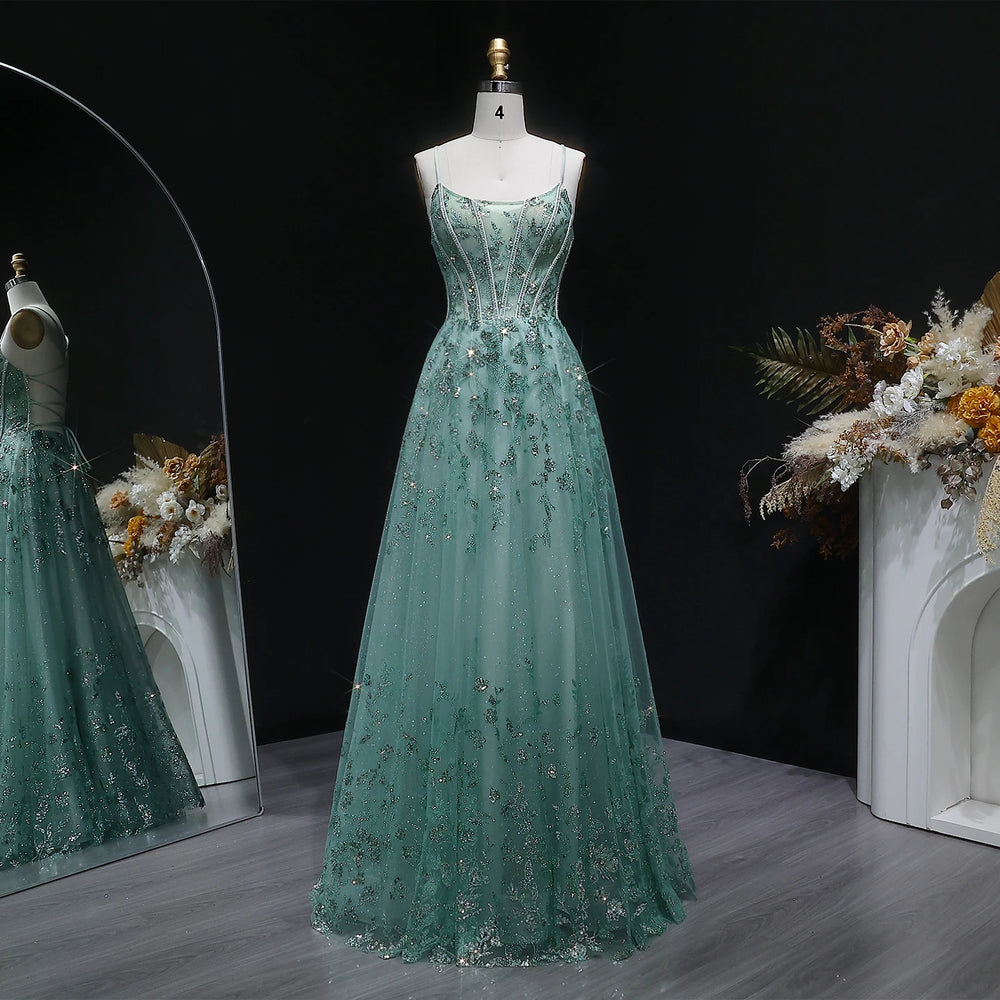 Crystal appliqué tulle A-line gown with spaghetti straps and boat neckline