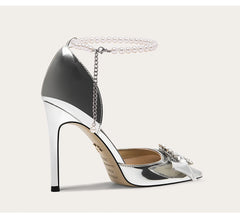 Crystal embellished party heels with metallic shine and statement bow