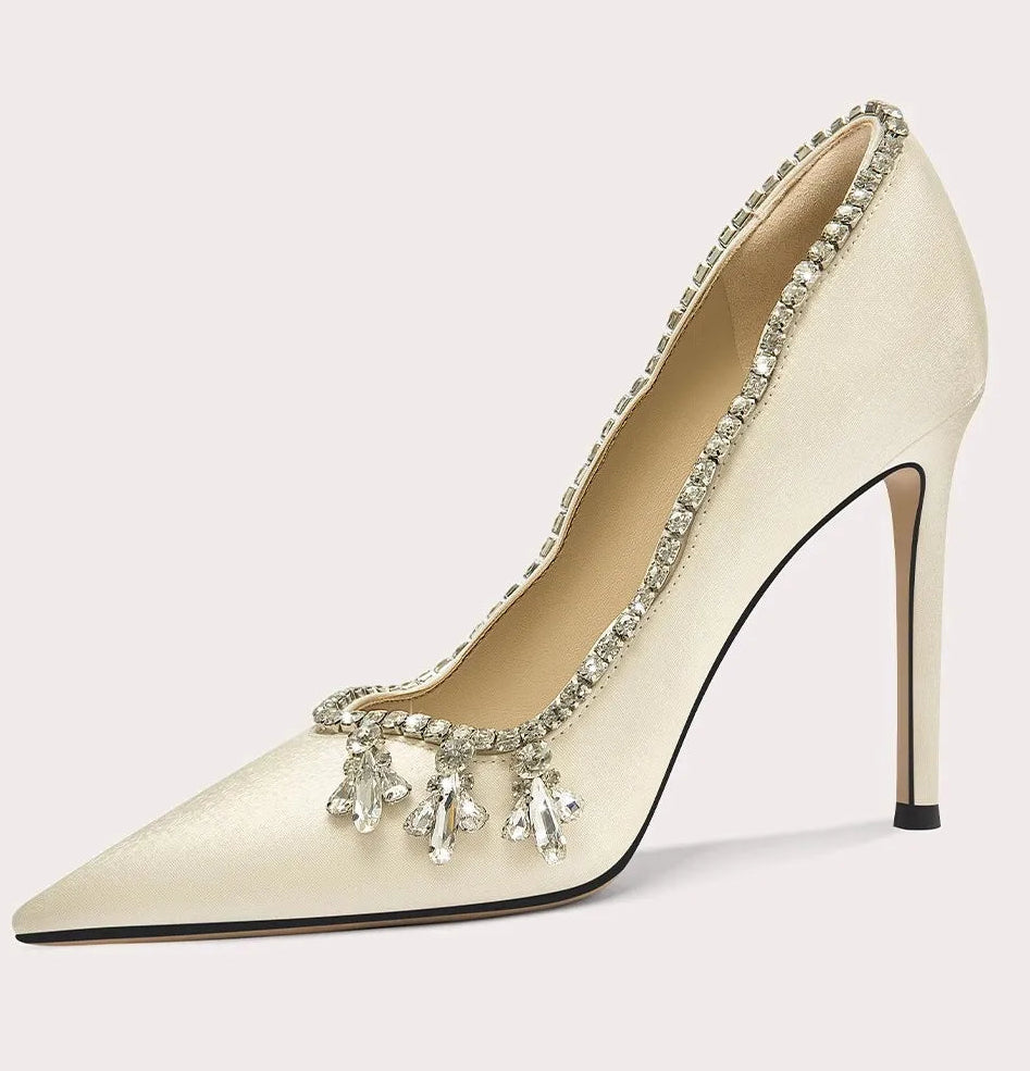 Pointed-toe pumps with crystal embellishment and slim high heel