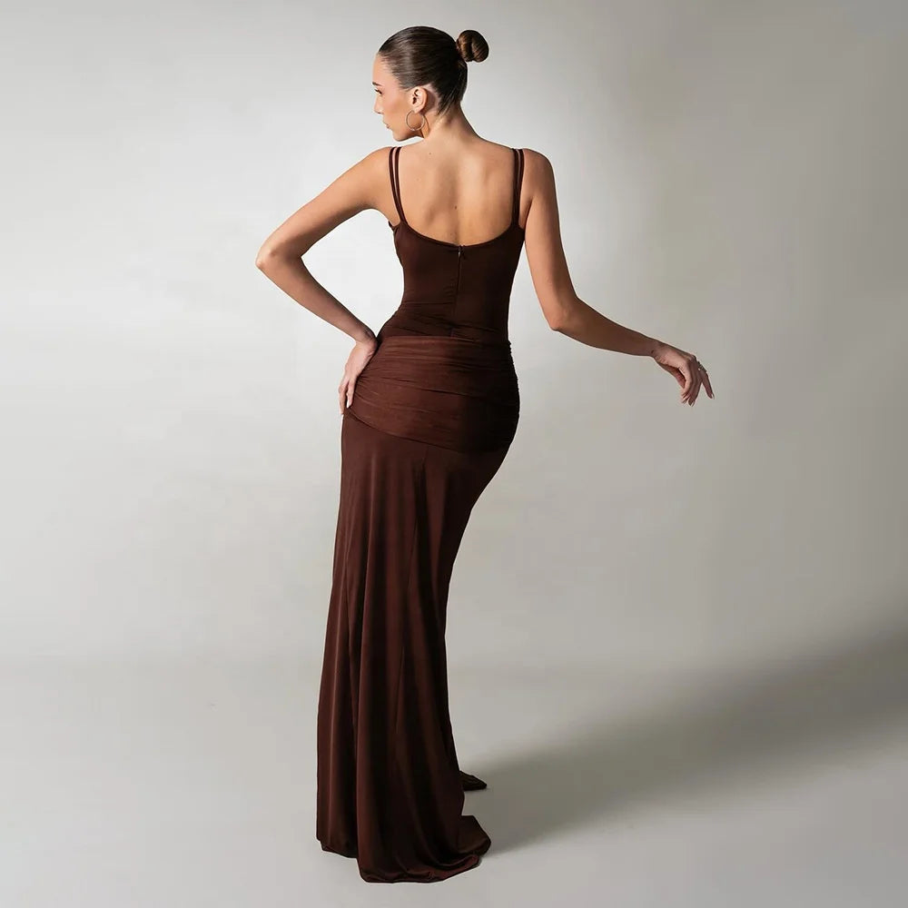 Evening gown with gathered front detailing and long flowing hem