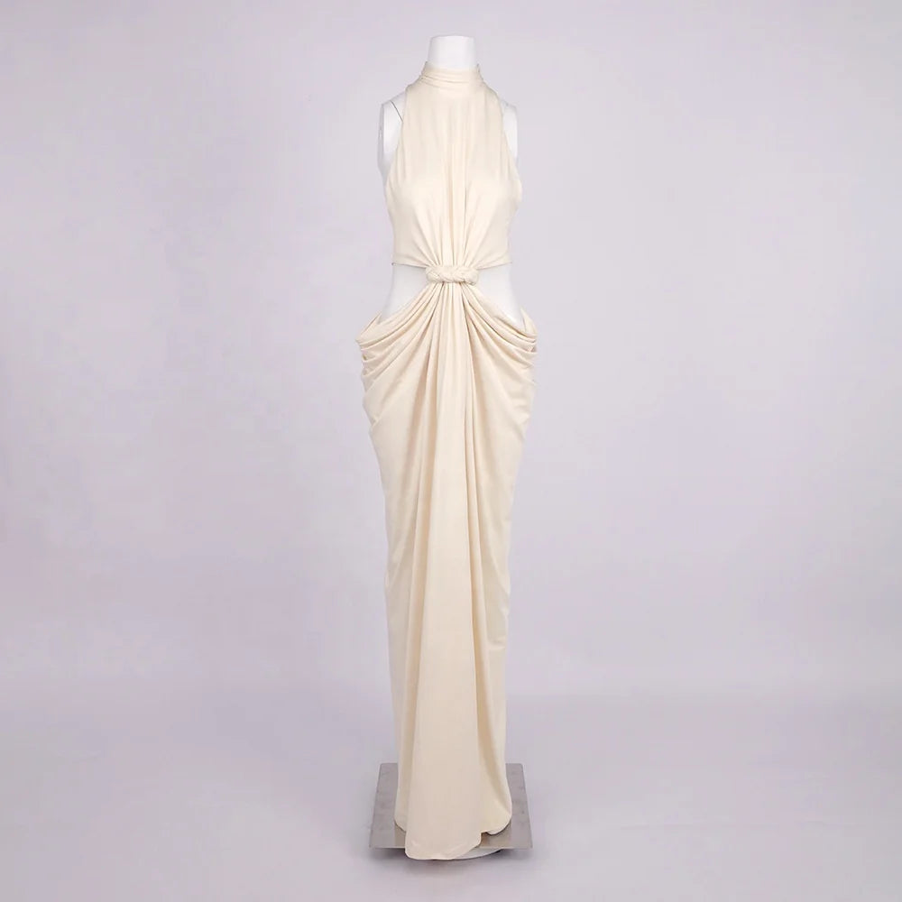 Sleeveless formal gown with gathered twist front and refined finish