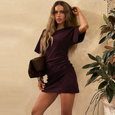 Dark purple short sleeve mini dress with ruched waist detail