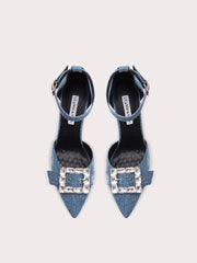 Pair of denim high heels with crystal buckles on a white background