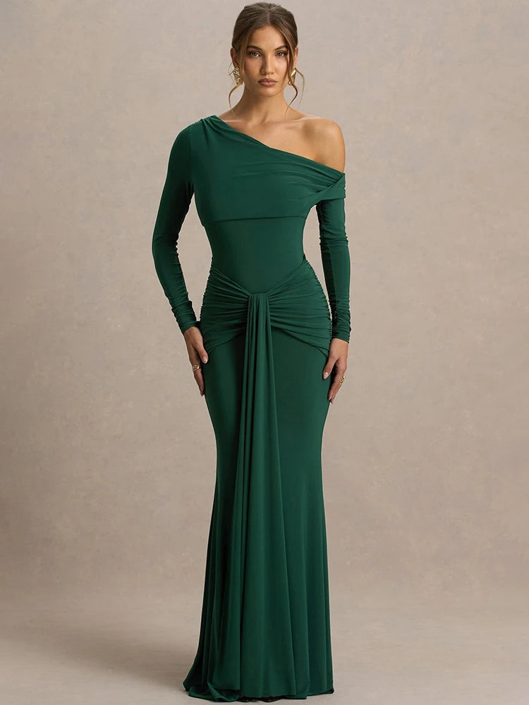 Close-up of the diagonal neckline and shoulder line, showing clean asymmetry and smooth fabric that frames the collarbone.