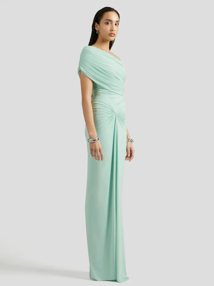 Diagonal neckline evening gown with fine pleats and folded drape