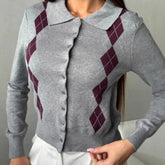 Knit cardigan with lapel collar and diamond pattern styled casually indoors