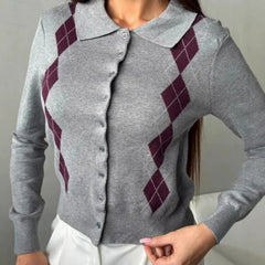 Knit cardigan with lapel collar and diamond pattern styled casually indoors