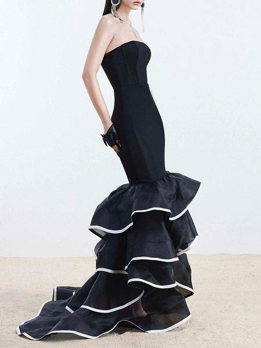 Dramatic tiered ruffle black gown in floor-length silhouette