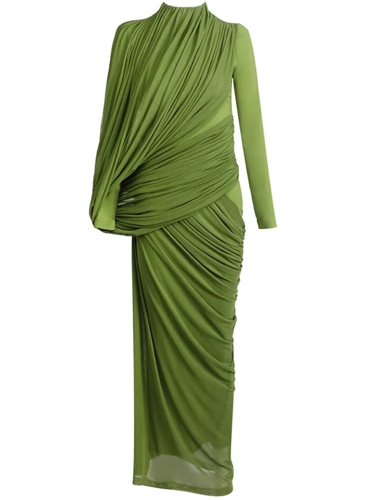 Three-quarter angle emphasizing the gathered drape at the waist and the clean high neckline, styled for a formal, modern occasion look.