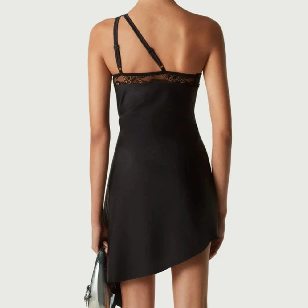 An elegant beach vacation dress styled casually for a day out.