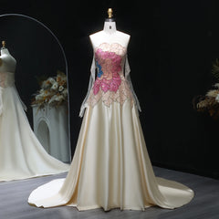 The full length of the A-line satin dress and matching gloves styled for a formal event.