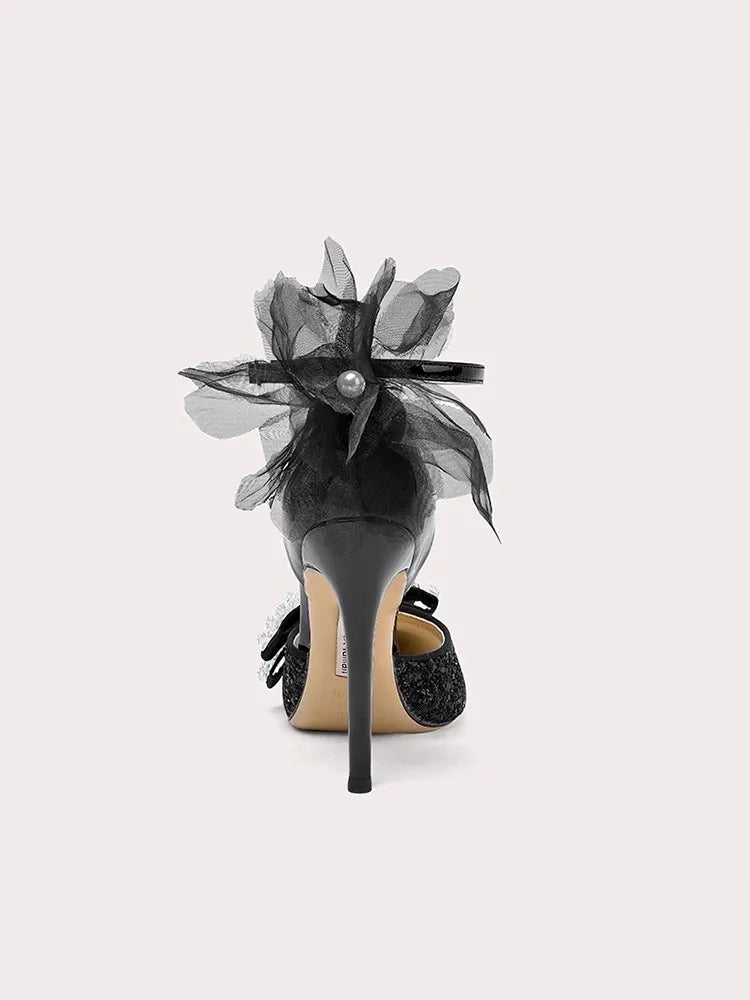 Elegant black event heels with crystals and sheer bow details