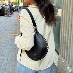 An elegant casual streetwear shirt, highlighting its comfortable fit.