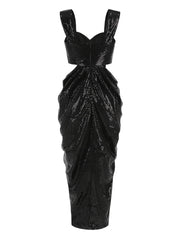 The back view of the dress shows the elegant backless design.