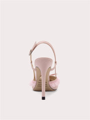 A pair of stylish pink sandals with a lace bow detail.
