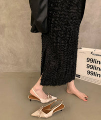 Side view of elegant purple slingback sandals for parties