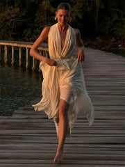 White resortwear set styled for sunset or destination events